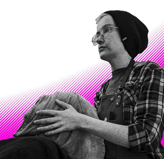 A picture of me, doing a hot towel treatment on a client.